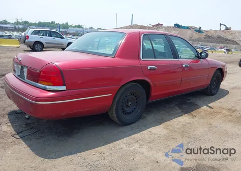2000 Ford Crown Victoria Lx z USA, uszkodzony, nr VIN 2FAFP74WXYX155073